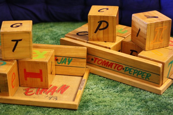 My name is first on the larger tray, a significance I was quick to point out to my older brother...