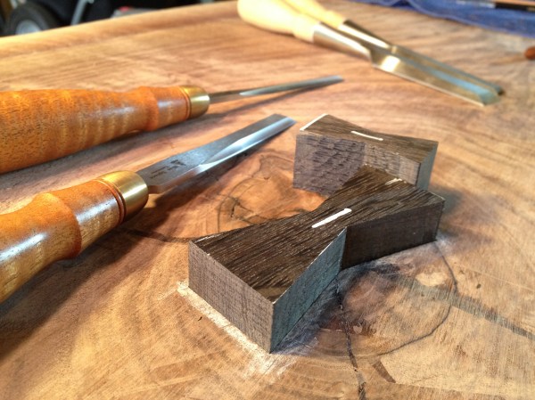 Testing the fit before gluing the first butterfly key into place...