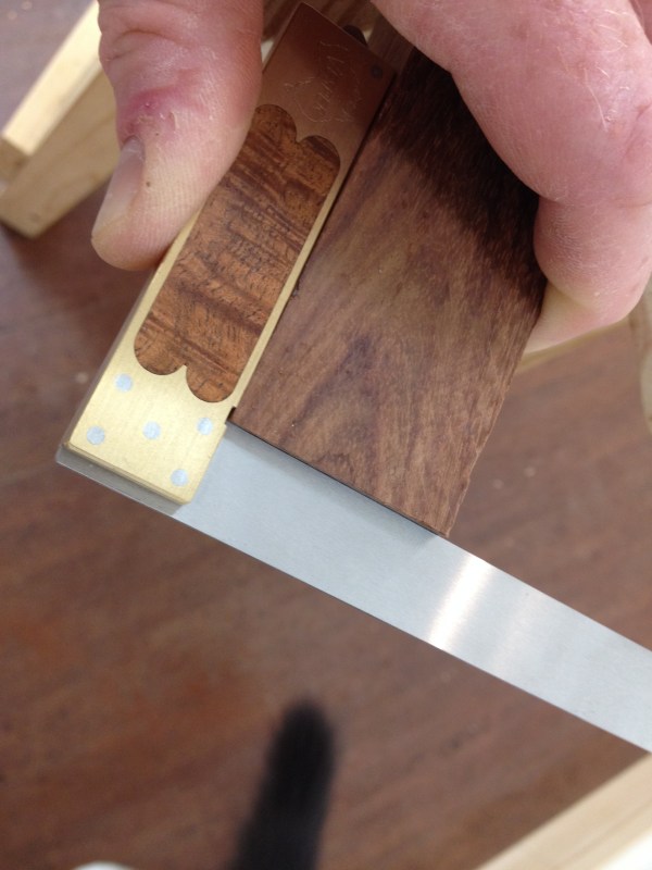 A square cut right off the saw; tail courtesy of Oliver the Cat